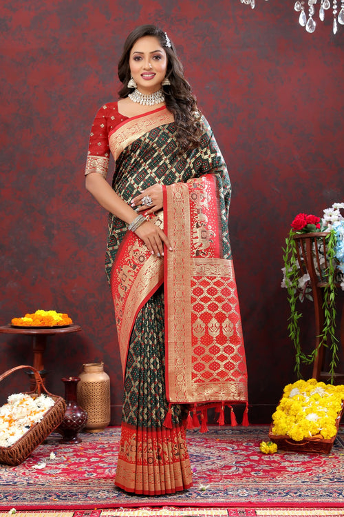 Load image into Gallery viewer, Gleaming Dark Green Patola Silk Saree with Posh Blouse Piece
