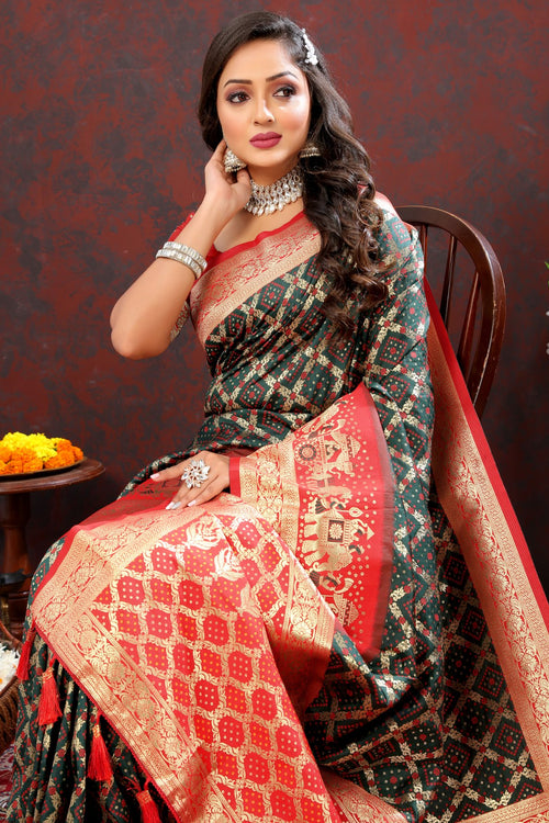 Load image into Gallery viewer, Gleaming Dark Green Patola Silk Saree with Posh Blouse Piece
