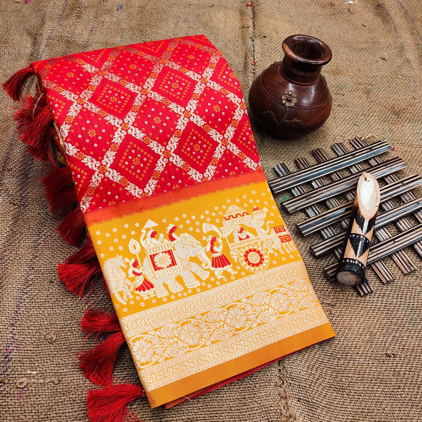 Groovy Red Patola Silk Saree with Scintillating Blouse Piece