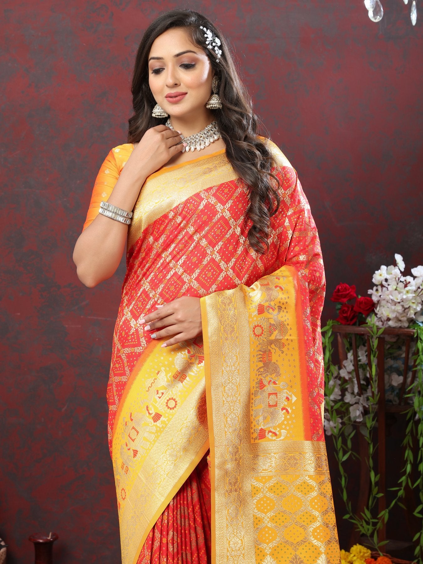 Groovy Red Patola Silk Saree with Scintillating Blouse Piece