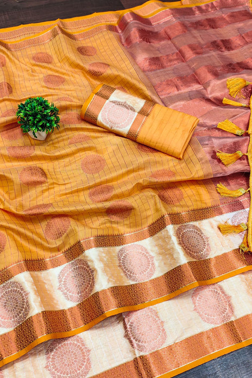 Load image into Gallery viewer, Engaging Mustard Cotton Silk Saree With Ornate Blouse Piece
