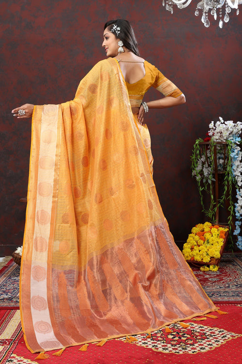 Load image into Gallery viewer, Engaging Mustard Cotton Silk Saree With Ornate Blouse Piece
