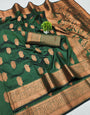 Unequalled Dark Green Soft Banarasi Silk Saree With Quixotic Blouse Piece