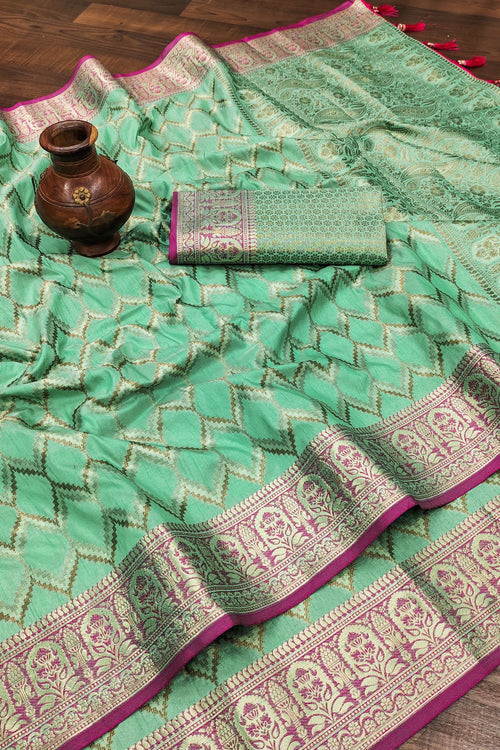 Load image into Gallery viewer, Confounding Sea Green Soft Banarasi Silk Saree With Artistic Blouse Piece
