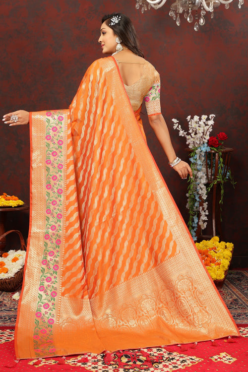 Load image into Gallery viewer, Snazzy Orange Soft Banarasi Silk Saree With Exuberant Blouse Piece
