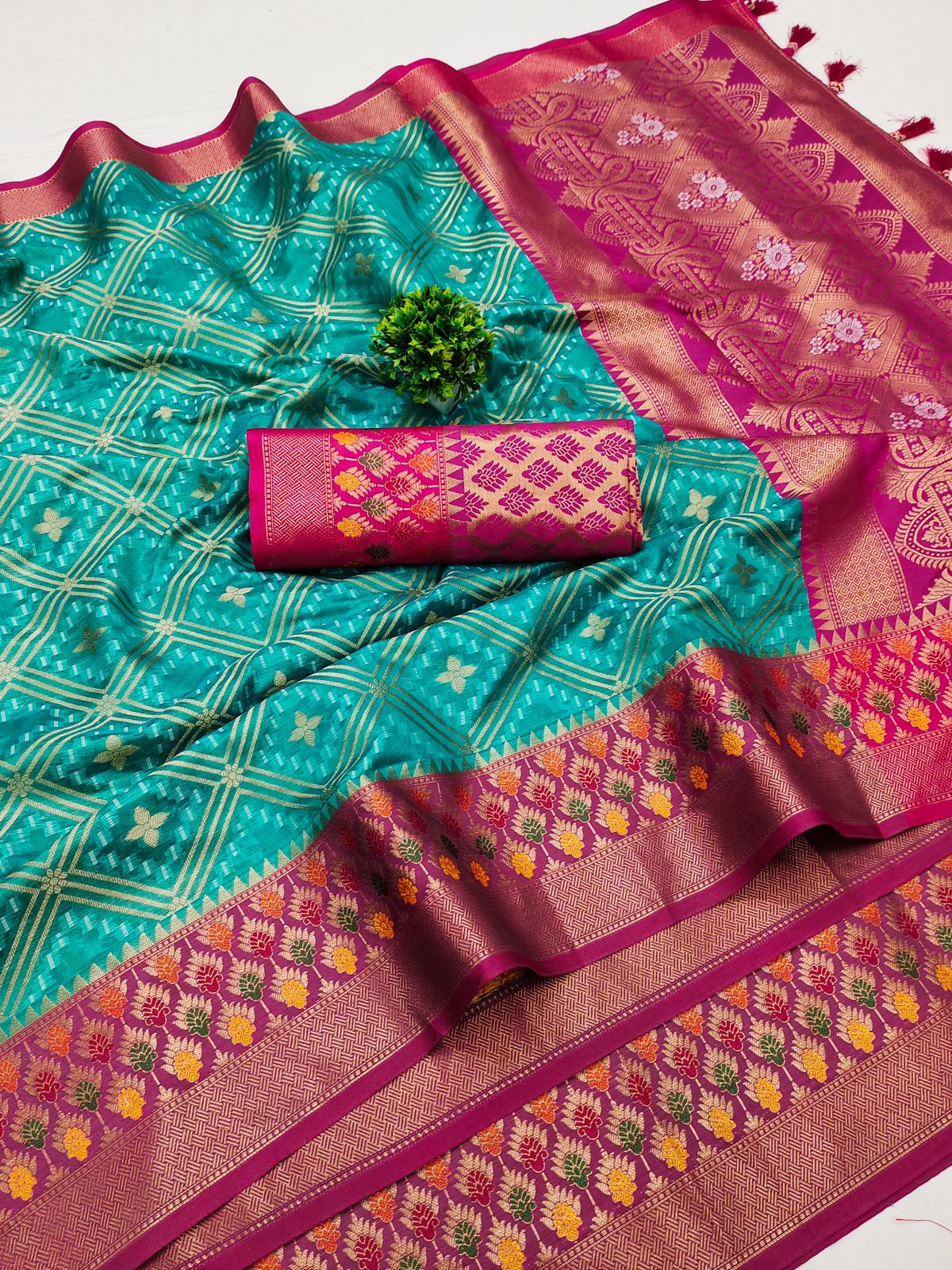 Cynosure Sea Green Soft Banarasi Silk Saree With Assemblage Blouse Piece