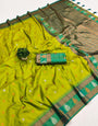 Opulent Parrot Soft Banarasi Silk Saree With Glorious Blouse Piece