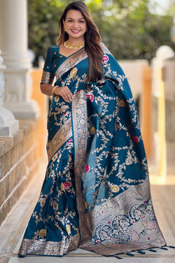 Effulgent Teal Blue Soft Banarasi Silk Saree With Embellished Blouse Piece