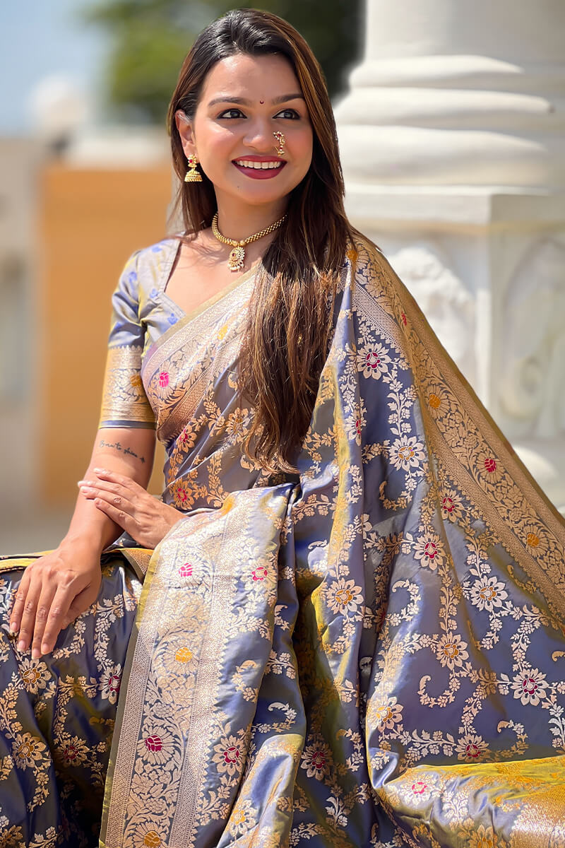 Staring Grey Soft Banarasi Silk Saree With Blooming Blouse Piece