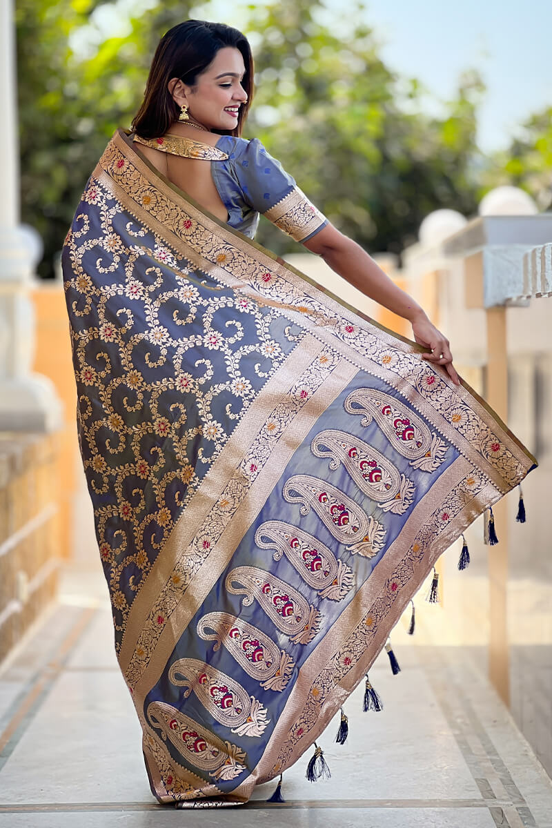 Staring Grey Soft Banarasi Silk Saree With Blooming Blouse Piece