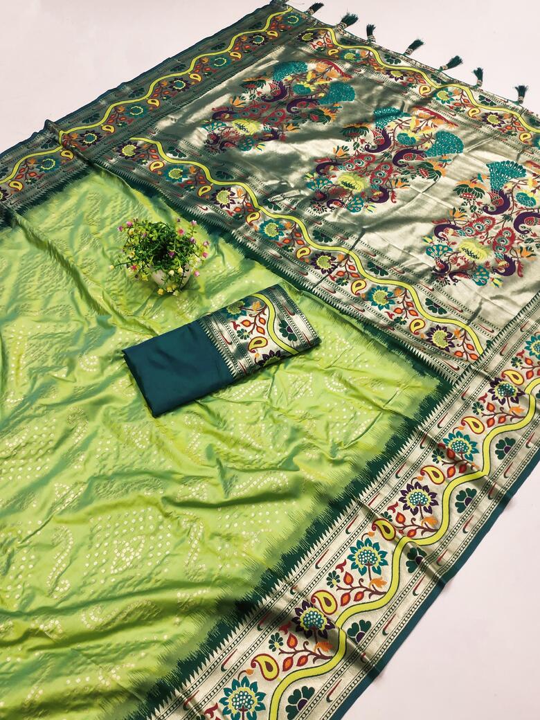 Artistic Pista Paithani Silk Saree With Tempting Blouse Piece