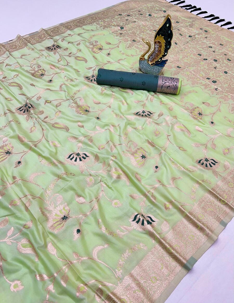Cynosure Pista Soft Banarasi Silk Saree With Whimsical Blouse Piece