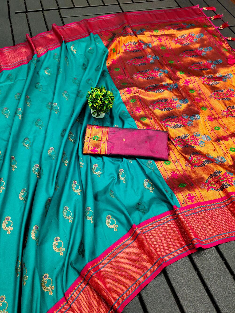 Inimitable Turquoise Paithani Silk Saree With Vibrant Blouse Piece