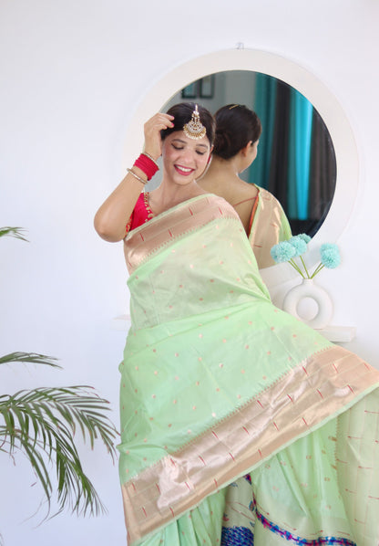 Prominent Pista Paithani Silk Saree With Radiant Blouse Piece