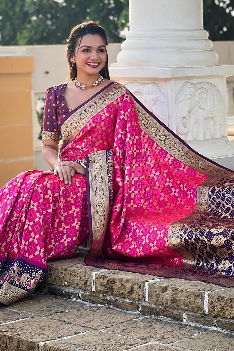 Sizzling Dark Pink Patola Silk Saree with Wonderful Blouse Piece