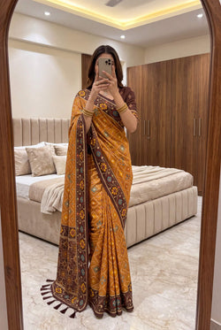Preferable Golden Patola Silk Saree with Sonorous Blouse Piece