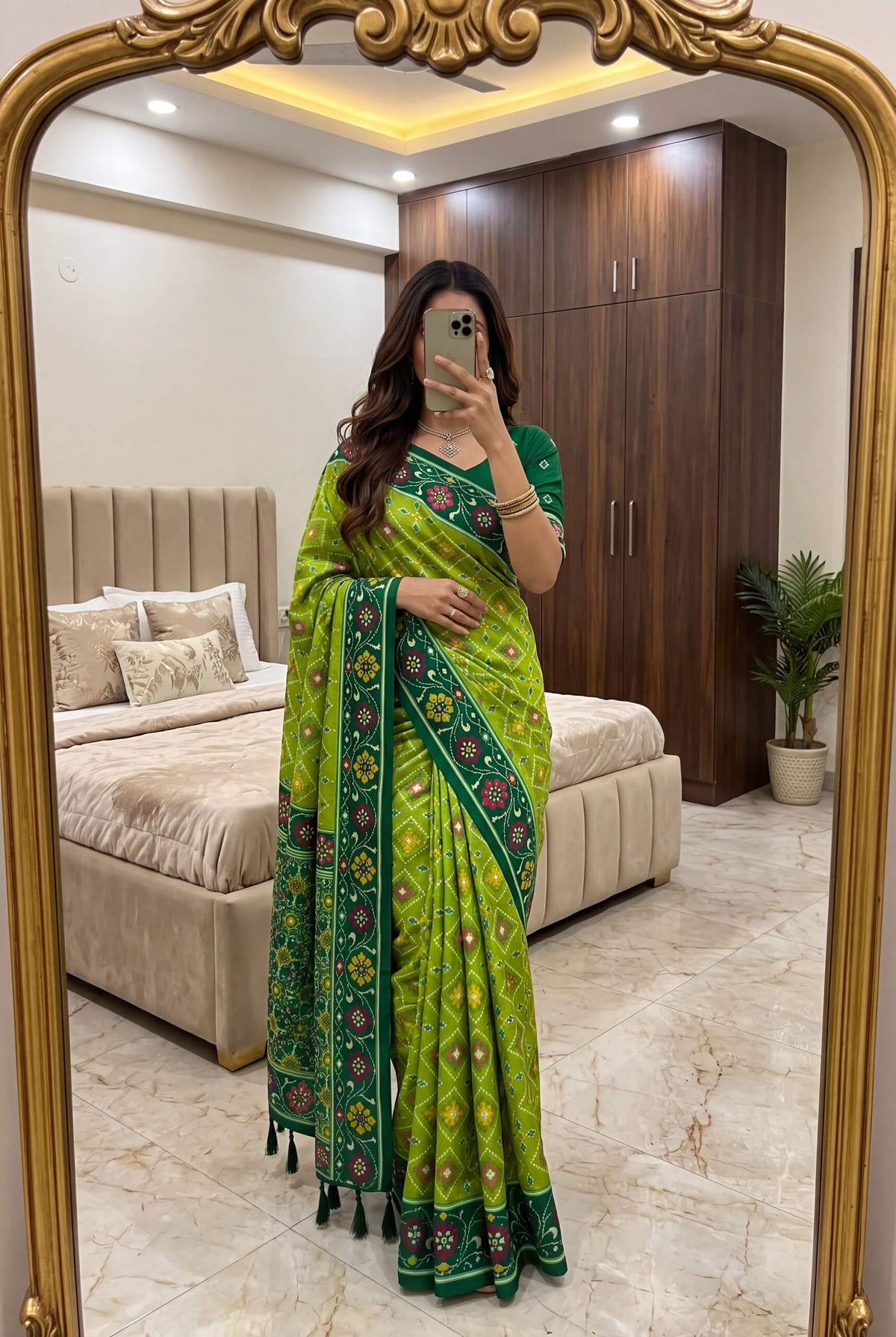Staring Green Patola Silk Saree with Profuse Blouse Piece