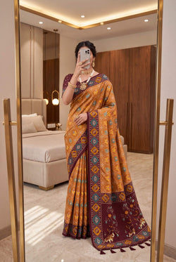 Bucolic Golden Patola Silk Saree with Glamorous Blouse Piece