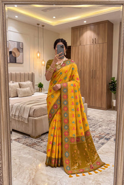 Excellent Yellow Patola Silk Saree with Nectarous Blouse Piece