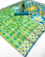 Engaging Parrot Soft Banarasi Ikkat Saree With Surreptitious Blouse Piece