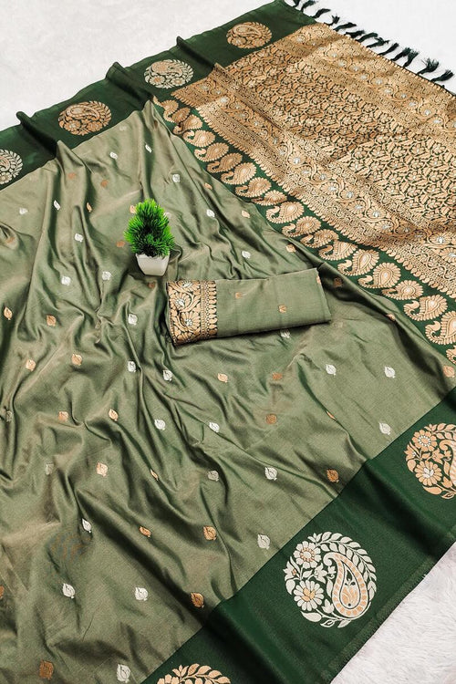Load image into Gallery viewer, Fancifull Dark Green Soft Banarasi Silk Saree With Transcendent Blouse Piece
