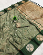 Fancifull Dark Green Soft Banarasi Silk Saree With Transcendent Blouse Piece
