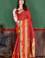 Bewitching Red Soft Banarasi Silk Saree With Demure Blouse Piece