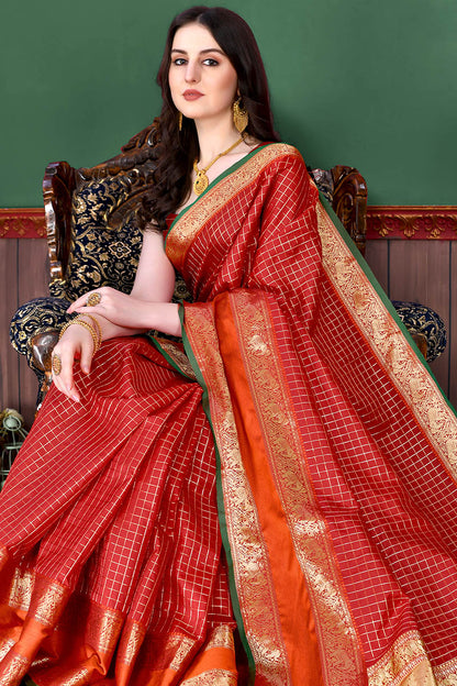Bewitching Red Soft Banarasi Silk Saree With Demure Blouse Piece