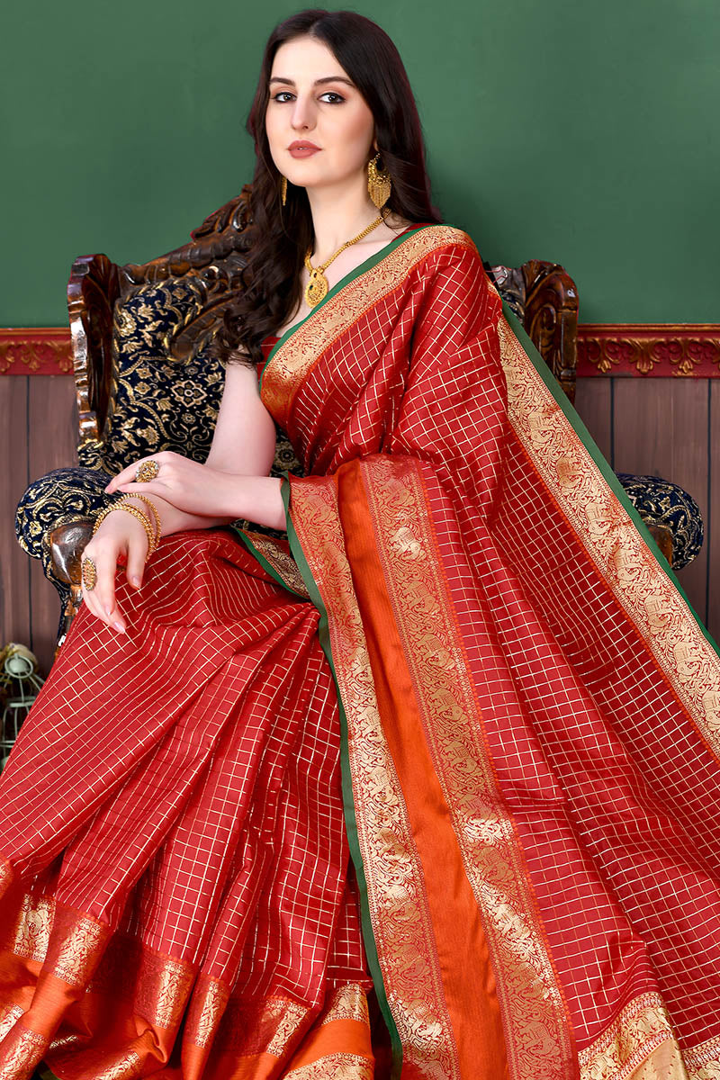 Bewitching Red Soft Banarasi Silk Saree With Demure Blouse Piece