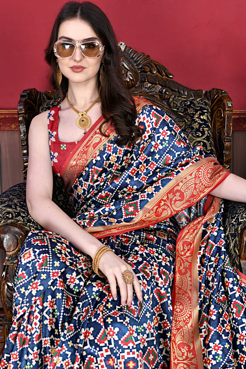 Load image into Gallery viewer, Fantabulous Blue Patola Silk Saree with Confounding Blouse Piece
