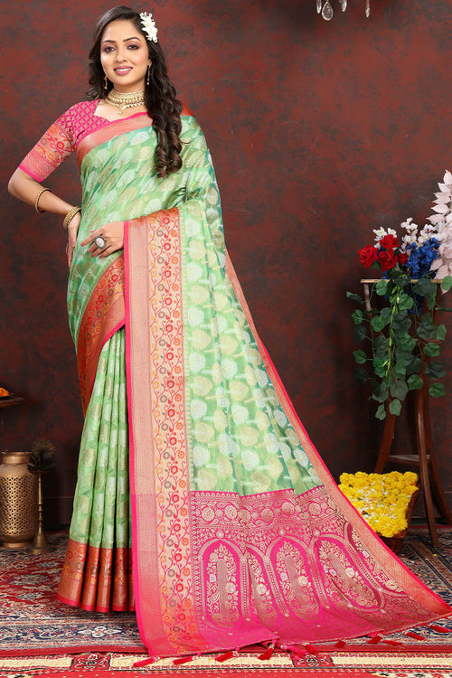 Load image into Gallery viewer, Lustrous Pista Soft Banarasi Silk Saree With Enamoring Blouse Piece
