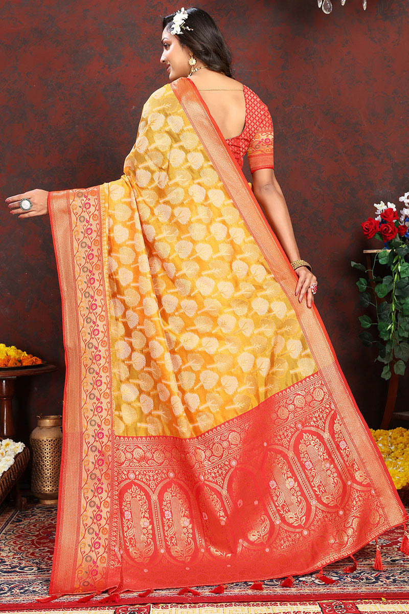 Enigmatic Yellow Soft Banarasi Silk Saree With Snappy Blouse Piece