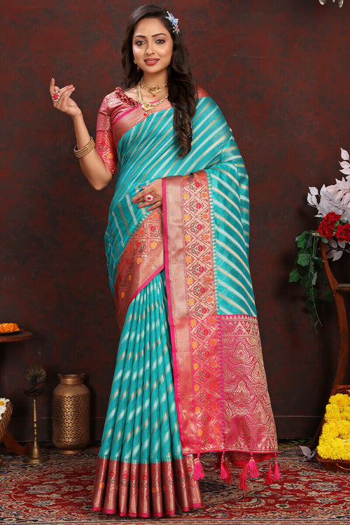 Load image into Gallery viewer, Enticing Firozi Soft Banarasi Silk Saree With Twirling Blouse Piece
