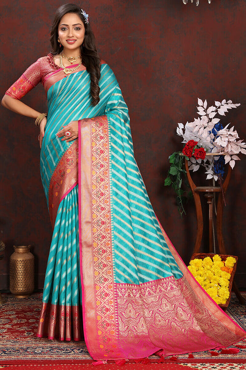 Load image into Gallery viewer, Enticing Firozi Soft Banarasi Silk Saree With Twirling Blouse Piece
