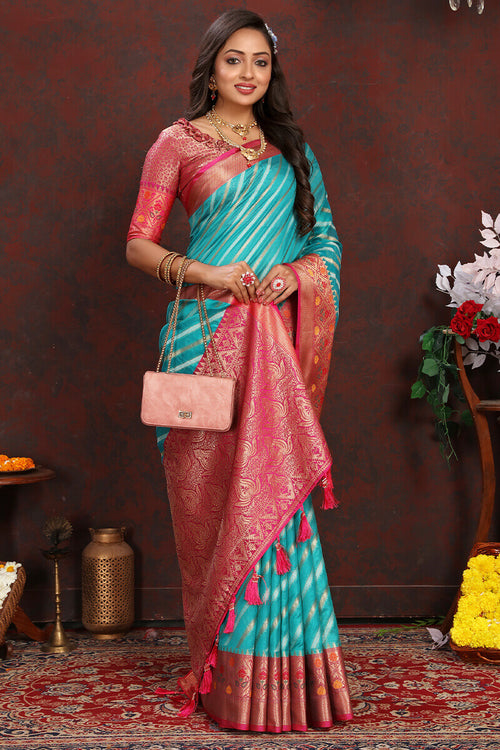 Load image into Gallery viewer, Enticing Firozi Soft Banarasi Silk Saree With Twirling Blouse Piece
