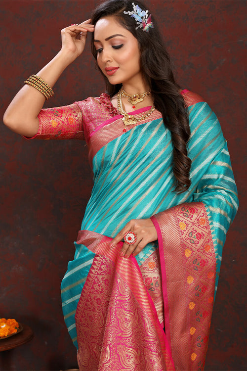 Load image into Gallery viewer, Enticing Firozi Soft Banarasi Silk Saree With Twirling Blouse Piece
