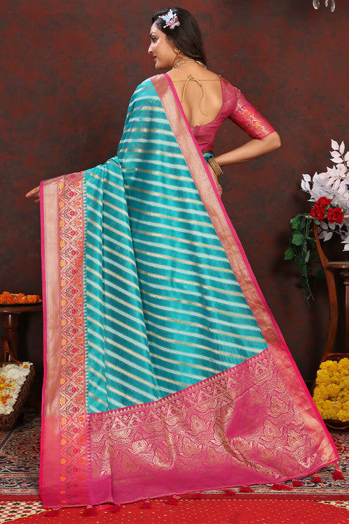 Load image into Gallery viewer, Enticing Firozi Soft Banarasi Silk Saree With Twirling Blouse Piece
