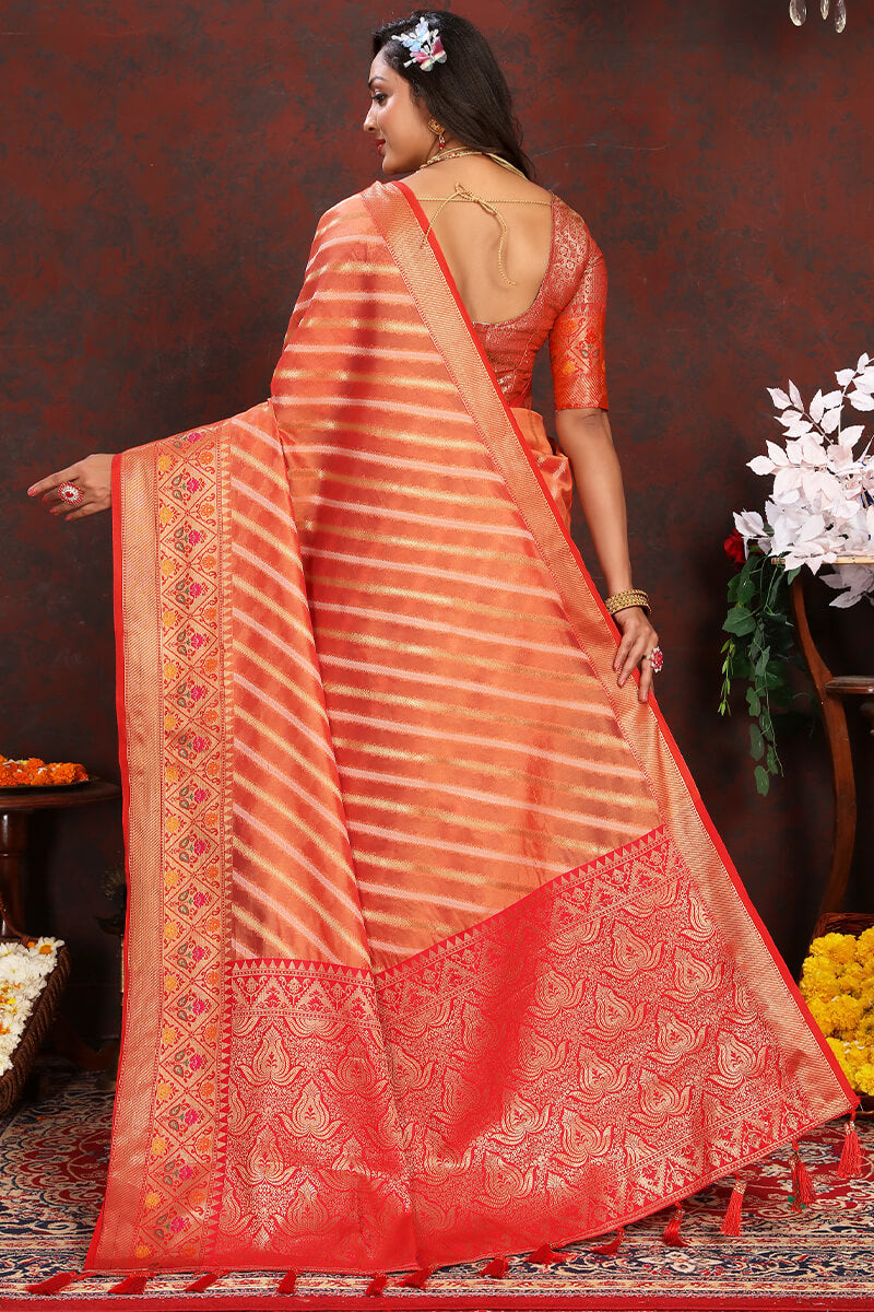 Pleasant Orange Soft Banarasi Silk Saree With Radiant Blouse Piece