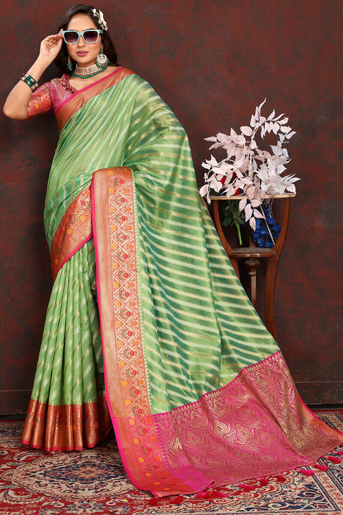 Load image into Gallery viewer, Dazzling Pista Soft Banarasi Silk Saree With Sizzling Blouse Piece
