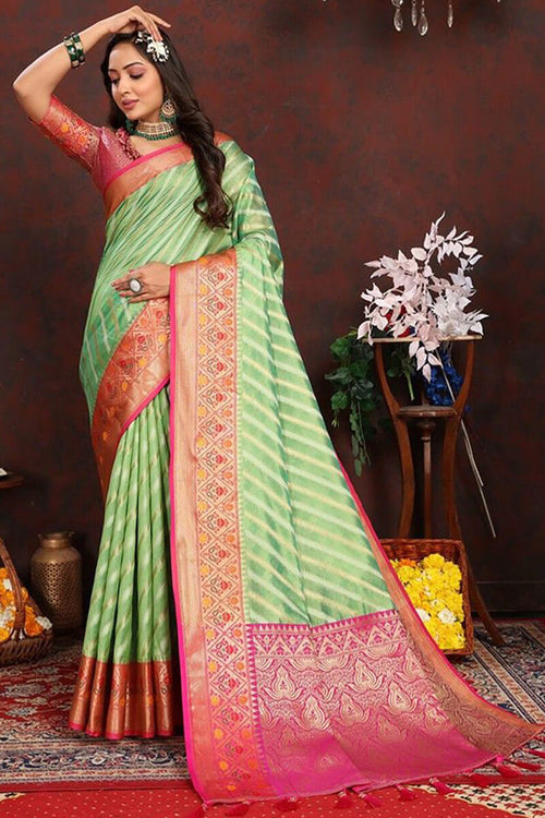 Load image into Gallery viewer, Dazzling Pista Soft Banarasi Silk Saree With Sizzling Blouse Piece
