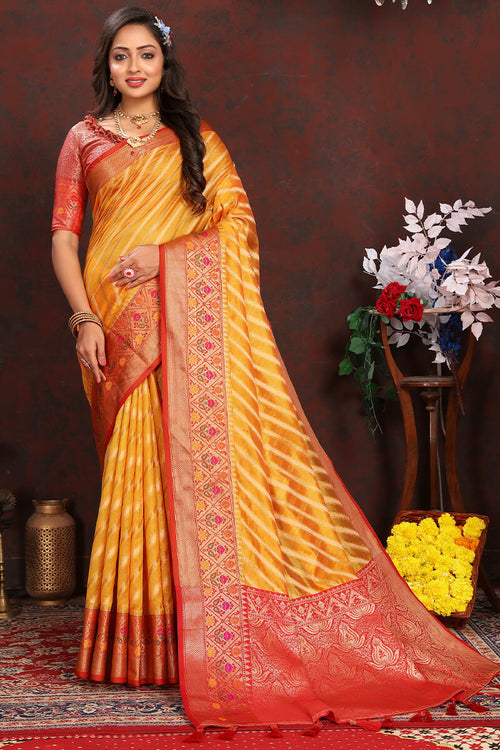 Load image into Gallery viewer, Flaunt Yellow Soft Banarasi Silk Saree With Flattering Blouse Piece
