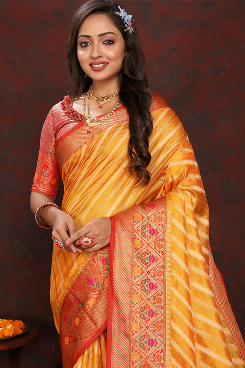 Load image into Gallery viewer, Flaunt Yellow Soft Banarasi Silk Saree With Flattering Blouse Piece
