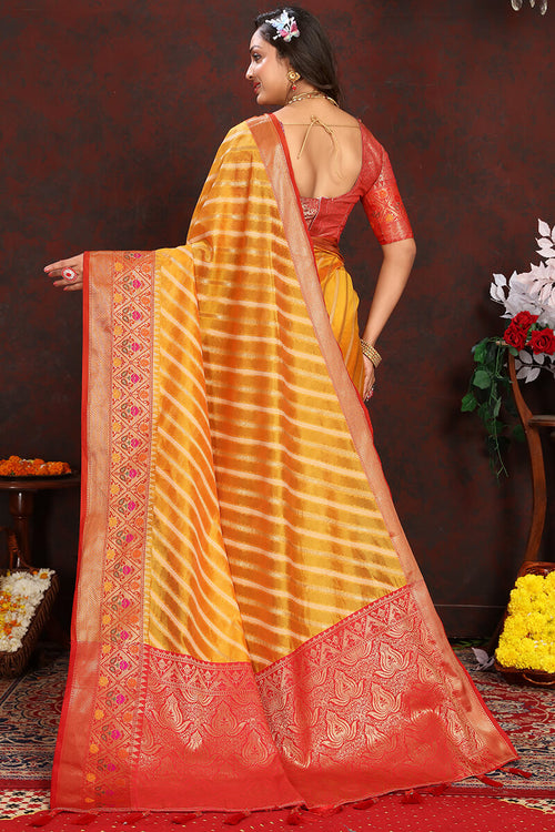 Load image into Gallery viewer, Flaunt Yellow Soft Banarasi Silk Saree With Flattering Blouse Piece
