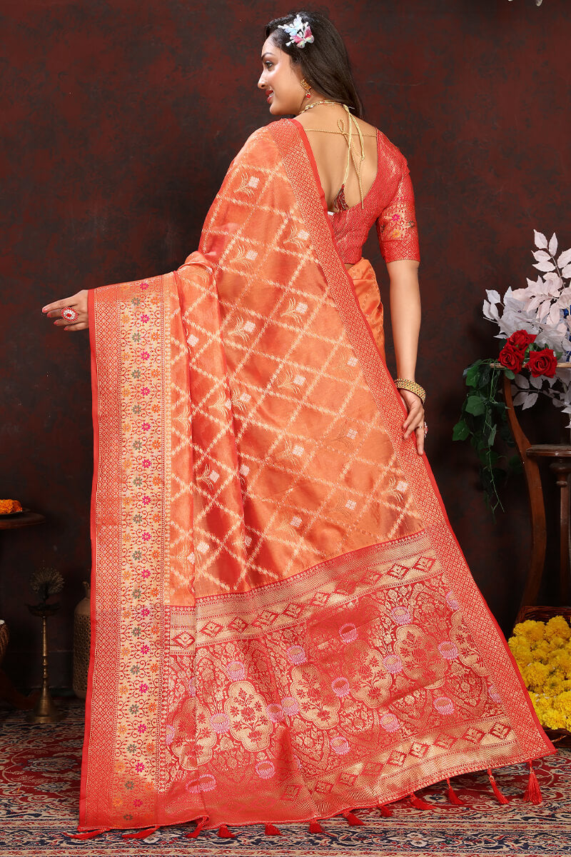 Invaluable Orange Soft Banarasi Silk Saree With Appealing Blouse Piece