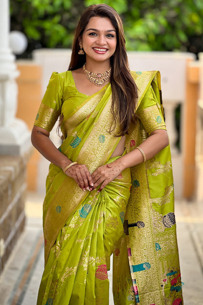 Flamboyant Parrot Soft Banarasi Silk Saree With Precious Blouse Piece