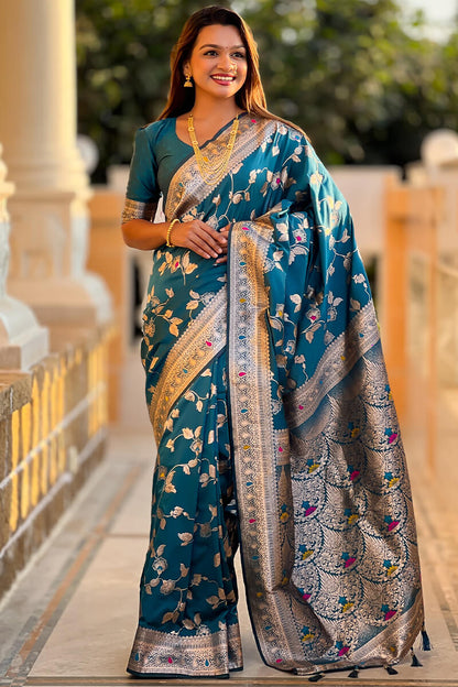 Ineffable Teal Blue Soft Banarasi Silk Saree With Zephyr Blouse Piece