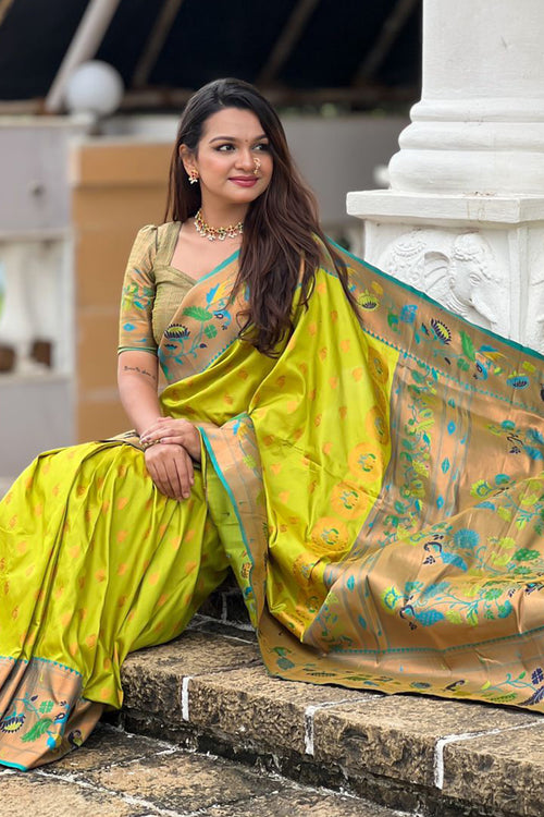 Load image into Gallery viewer, Flaunt Parrot Paithani Silk Saree With Gratifying Blouse Piece
