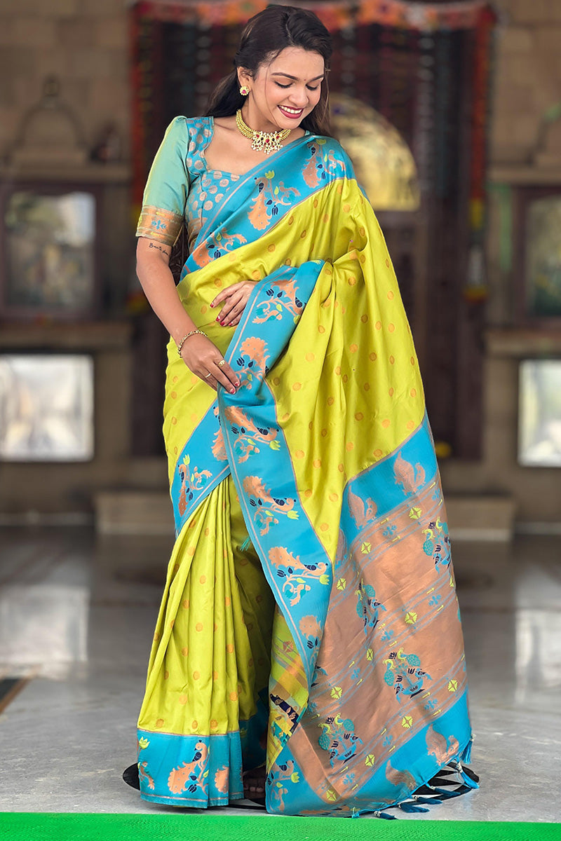 Opulent Parrot Paithani Silk Saree With Delightful Blouse Piece