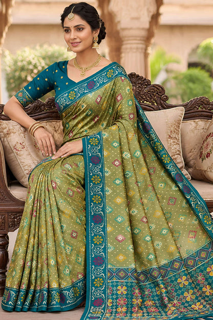 Divine Pista Patola Silk Saree with Vibrant Blouse Piece