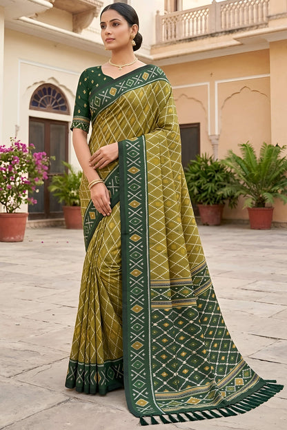 Imbrication Green Patola Silk Saree with Evocative Blouse Piece
